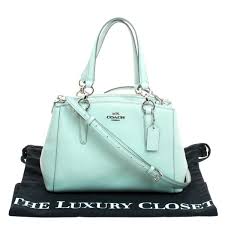 Everything hanging with enough space, things folded neatly, and never overstuffed. Coach Mint Green Leather Stanton Top Handle Bag Coach Tlc