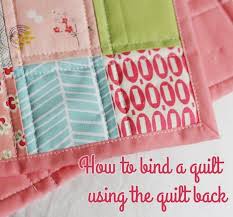 It simplifies quilting for beginners because it is an easy way to join quilted pieces by machine. Binding A Quilt With The Quilt Back Cluck Cluck Sew