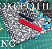 DIY Bookcloth; Backing Fabric with Paper // Adventures in Bookbinding