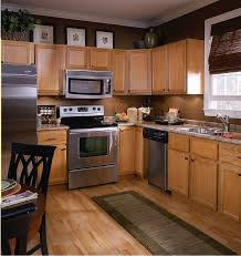 Brown Paint Maple Cabinets With Stainless Brown Kitchen Cabinets Brown Kitchens Light Oak Cabinets