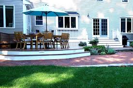 When deciding between a wood deck or a cement patio, there are several things to consider usually patios are created with various types of foundations, including concrete, stone, tile, brick or rock. Deck Patio Design In Eastern Ma Horticultural Concepts