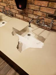 texas cut out over a square sink. : sinks
