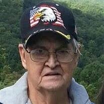 John B. Dollens Obituary