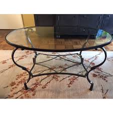 Round out your décor with this distressed black metal and glass cocktail table. Pier 1 Chasca Collection Glass Top Oval Coffee Table Aptdeco