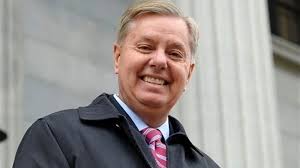 Graham speaking at a press conference and basking. Is Lindsey Graham Gay Or Does He Have A Wife What Is His Net Worth