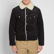 Flap pockets and log flag at chest. Maison Kitsune Corduroy Trucker Jacket Black End