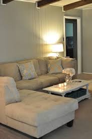 I painted right over the paneling in three of those rooms but of course you can still see the grooves in the paneling and while that doesn't look bad, it still looks coastal living room remodel. How To Paint Wood Paneling Diy Instructions Monica Wants It