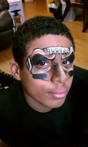 Very cool football face painting idea.