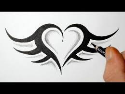 How To Draw A Simple Tribal Heart Tattoo With Wings Youtube Heart Drawing Tribal Drawings Tribal Heart Tattoos
