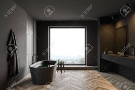 Small contemporary bathroom in other with white cabinets, white tile, ceramic tile, white walls, terrazzo floors, wood benchtops, an open shower, a curbless shower, grey floor and brown benchtops. Side View Of Spacious Bathroom With Dark Grey Walls Wooden Floor Stock Photo Picture And Royalty Free Image Image 139678744