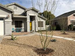 The landscape used curbing to add appeal to its front yard. Update Our Modern Desert Front Yard Rising Shining
