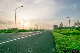 Sun disappears below the horizon. Street In The Morning With Sunrise Background Fresh Morning Time Stock Photo Picture And Royalty Free Image Image 86791413