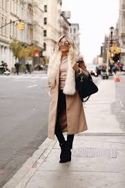 Stop for a moment and consider the camel coat. Venice Greel Looks Ultra Glamorous In This Classic Style Beige Coat Worn With A Gorgeous Faux