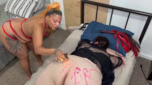 Blonde shemale Diosa striking in commanding femdom outfit