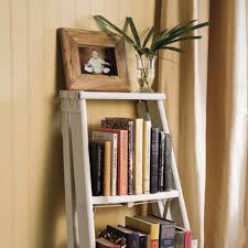 Ladder towel shelf ~ the top portion of an old wooden ladder was cut off to be used as a towel storage shelf. My Decorative Ladder Ladder Decor Repurposed Ladders Ladder Bookshelf