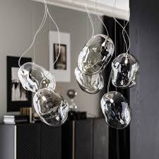 Dinners with your significant other will be extra romantic with this cloud ceiling light hanging above. Cloud Ceiling And Table Light Modern Lighting Design