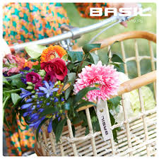 Just imagine, thousands of bicycles with baskets of flowers being ridden through the streets of your town. Basil Green Life Rotan Bicycle Basket Large Front Natural Brown Basil