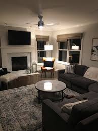 Brighten a spacious seating area with this handsome lamp. Arc Lamp Over Sectional Or More Traditional Floor Lamp