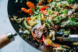 Chang's home menu products bring your favorite chinese restaurant to your kitchen table. Vegetable Stir Fry In A Wok With Sesame Seeds Topping By Gabriel Gabi Bucataru Stocksy United