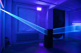 Blue Rays Created By Illuminating Fishing Line With Uv Light Light Installation Blue Artistic Installation