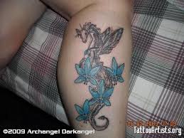 We know that many of these designs may look totally overwhelming to some of you.but no fear perhaps our favorite inspo for small dragon tattoos is the small wrist design that the mother of dragons herself, emilia clarke, got from famed tattooist dr. 60 Dragon And Flowers Tattoo Designs Ideas