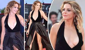 Claudia gerini, pierfrancesco favino, omero antonutti, renato carpentieri. Claudia Gerini Red Faced As She Flashes Knickers In Saucy Gown At Venice Festival Celebrity News Showbiz Tv Express Co Uk