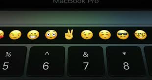Macbook Pro S Crazy Touch Bar Puts Emoji Right In Your Keyboard Read More Technology News Here Http Macbook Pro Macbook Pro Touch Bar Macbook Pro Laptop