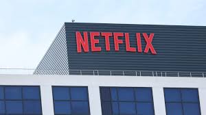 nflx stock drops as Reed Hastings departs