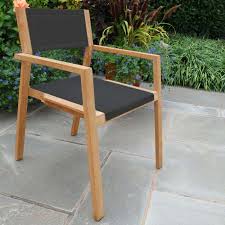 Stackable Outdoor Dining Chairs Summit Teak Stacking Chair In Charcoal Outdoor Furniture Small Space Outdoor Dining Chairs Teak Chairs