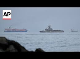Iran is deciding who gets through the Strait of Hormuz safely and who gets  threatened - YouTube
