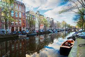 The netherlands is famous for its polders and dikes. Dutch City Scenery With Canal And Mirror Reflections In Water Stock Photo Picture And Royalty Free Image Image 91211250