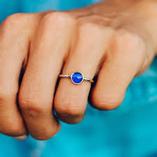The variety of colors that a mood ring reflects exist on a spectrum similar to what you'd see in a rainbow. Silver Mood Ring Pura Vida Bracelets