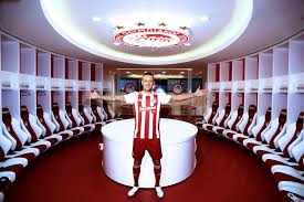 Barcelona's midfielder rafinha holds up the tropphy after the uefa champions league final football match between juventus and fc barcelona at the. Olympiacos Reveal Rafinha Signing Agonasport Com