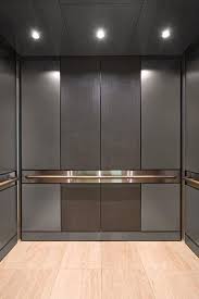 Levele 105 Elevator Interior With Customized Panel Layout Panels In Bonded Nickel Silver With Dark P Elevator Interior Wardrobe Design Bedroom Cupboard Design