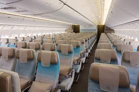 This aircraft is one of the newest additions to the singapore fleet and has updated seats and entertainment. Economy Class Cabin On Boeing 777 300er Flight Chic