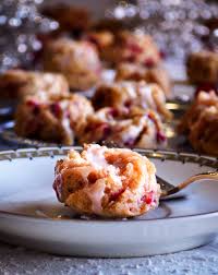 If the cake is sticking, place it back in the warm oven for about 5 to 10 minutes. Mini Cranberry Bundt Cakes With Lemon Glaze Of Batter And Dough