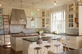 White painted cabinets give your kitchen a clean, airy look, but they can turn yellow with time. Out Of Curiosity Painted Or Stained Kitchen Cabinets Addicted 2 Decorating