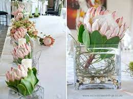 Pin By M On Flower Arranging Table Flower Arrangements Protea Wedding Table Arrangements Wedding