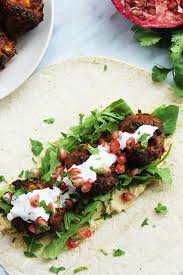 A recipe from one of my husband's colleagues. Baked Lamb Meatballs With Harissa And Feta Slow The Cook Down