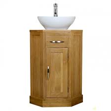 A vanity unit is a piece of furniture which includes a bathroom basin and a storage unit. Corner Oak Cloakroom Vanity Unit With Basin Bathroom Inspire Mobel Oak