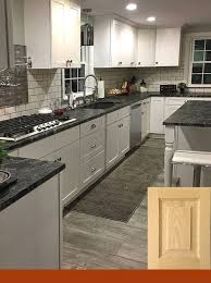 Backsplash For White Cabinets And Black Granite Countertops Kitchen Remodel Countertops Kitchen Countertops Laminate New Kitchen Cabinets
