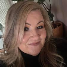 Who can recommend a good dog groomer for a Portuguese Water Dog?