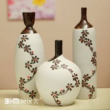 35 Designs Of Ceramic Vases For Your Home Decoration Glass Bottle Diy Diy Bottle Crafts Painted Glass Bottles
