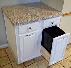 How To Transform Used Kitchen Cabinets In A New Space Trash Can Cabinet Used Kitchen Cabinets Diy Kitchen