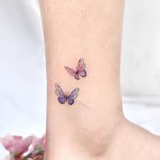Palettes On Instagram Take The Ankle I Sculpt A Mixture Of Two Small Violets Tiny Butterfly Tattoo Butterfly Ankle Tattoos Ankle Tattoo