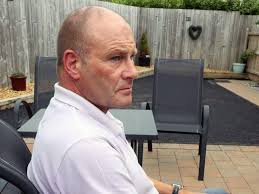 Former Magilligan prison officer Graeme Anderson says he was sacked for  taking sex case against his gay boss Andrew Cromie