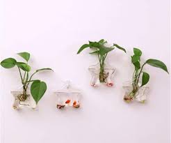 A living wall is a hanging installation where several plants are planted in soil pockets or planters. 27 Best Wall Hanging Planters For Indoors Outdoors 2021
