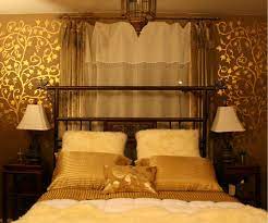 Britany simon design arcadia residence transitional bedroom with stunning royal blue upholstered bed, neutral gray walls, gold and yellow accents. 36 Very Awesome Gold Decor Ideas That Are Simple Yet Pleasurable Stunning Photos Decoratorist