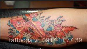 Hình xăm cá chép hóa rồng ở cổ tay. Vi Sao Nen Lá»±a Chá»n Hinh XÄƒm Ca Chep Hoa Sen Tattoo Ga
