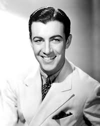 Tom Purvis operated the Ford dealership in Mattoon from 1939 until 1956.  During WWII, Purvis, a licensed pilot served as a senior Naval flight  instructor. While in that capacity, Purvis met the